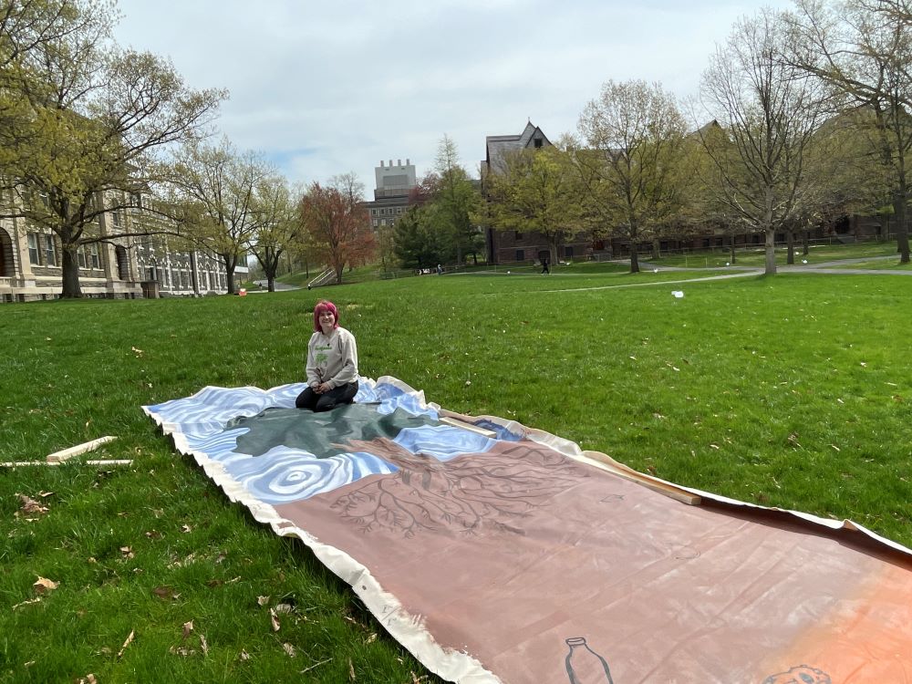 image of me on the canvas as I prep it for install