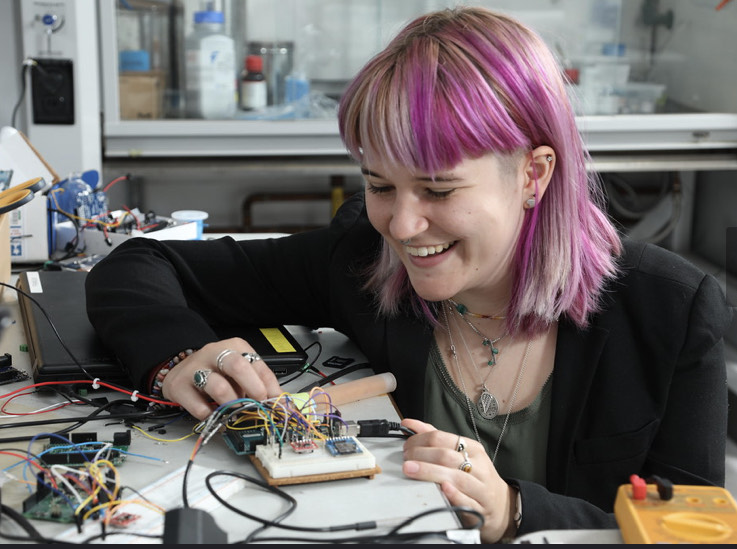 image of me (Sofia Echavarria) with an Arduino